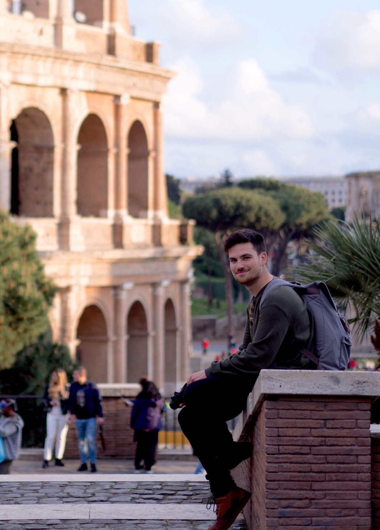 A picture of me in front of the Rome Colosseum